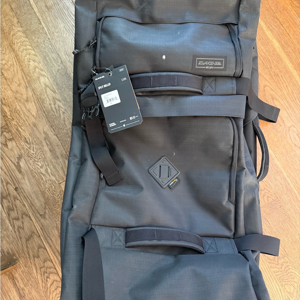 Dakine Black Travel Bag with Durable Design